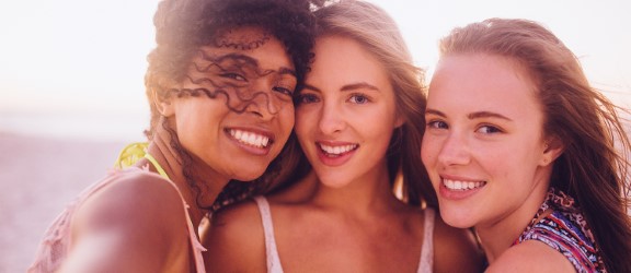  Teenage girls on the beach 